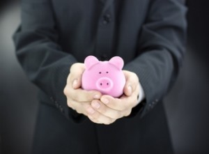 Man holding piggy bank